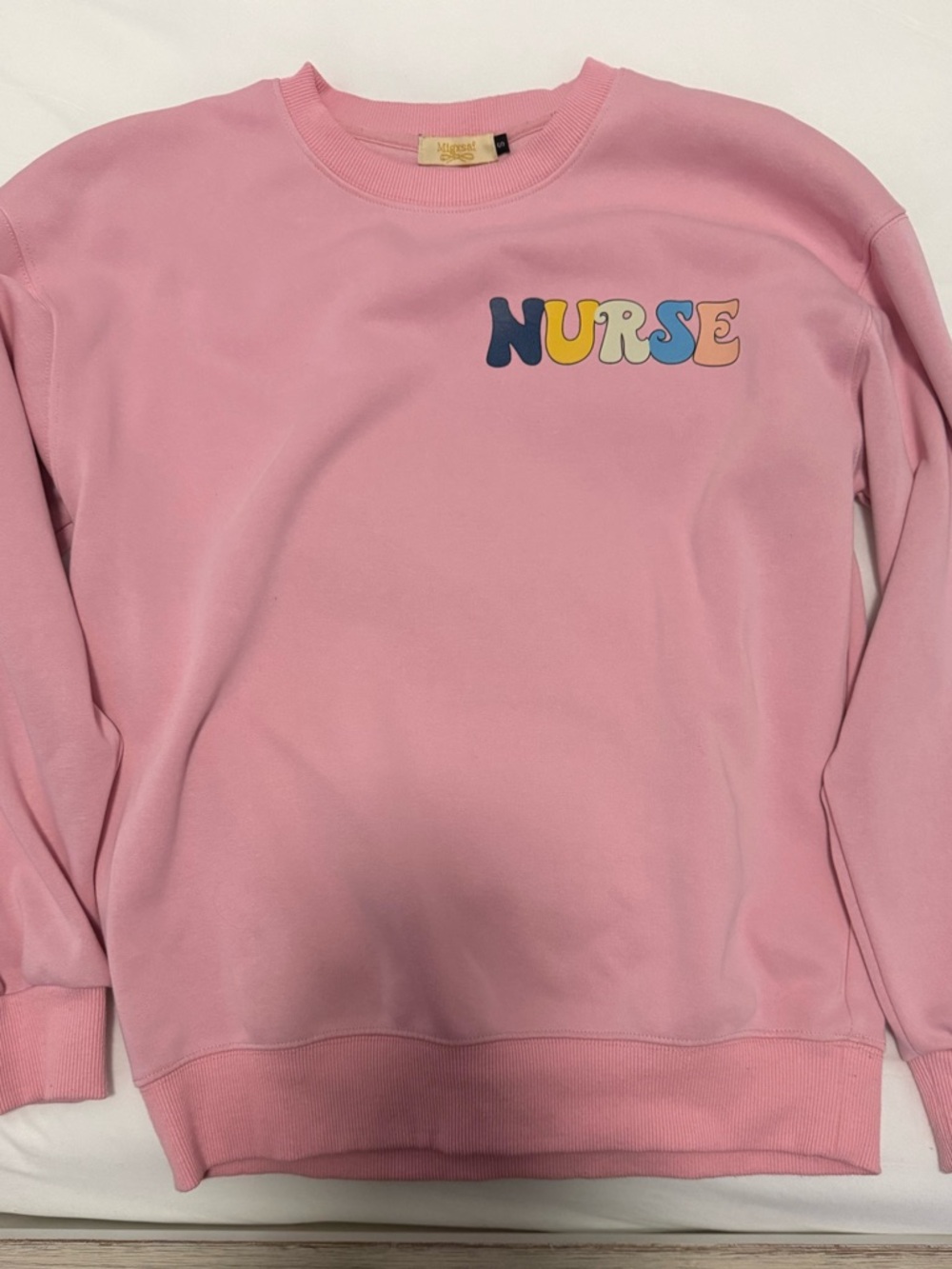 Pink Crewneck Sweatshirt with Multicolor "NURSE" Print